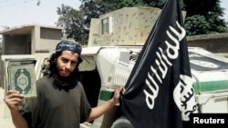 An undated photograph of a man described as Abdelhamid Abaaoud that was published in the Islamic State's online magazine Dabiq and posted on a social media website. 