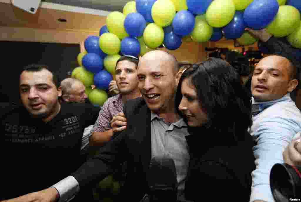 Head of the Jewish Home party Naftali Bennett arrives at his party's headquarters in Ramat Gan, near Tel Aviv, after exit polls were announced, January 22, 2013. 