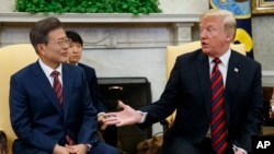 President Donald Trump meets with South Korean President Moon Jae-In in the Oval Office of the White House, May 22, 2018, in Washington. 