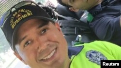 Slain Dallas police officer Patrick Zamarripa is pictured in this undated family handout photo.