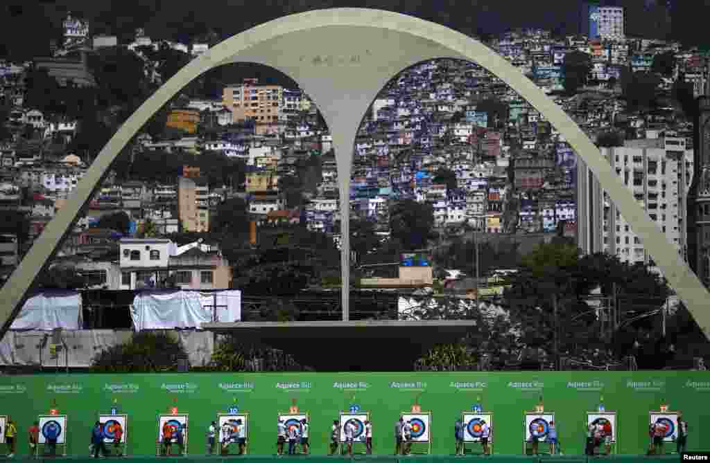 Athletes check their results during the International Archery Challenge at Rio de Janeiro&#39;s Sambadrome, Brazil, Sept. 15, 2015. The International Archery Challenge is a test event for Rio 2016 Olympic Games.