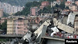 The collapsed Morandi Bridge is seen in the Italian port city of Genoa, Italy, Aug. 14, 2018. 