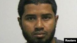 FILE - Akayed Ullah, a Bangladeshi immigrant who set off a crude pipe bomb at a New York commuter hub during morning rush hour Monday, is seen in a handout photo received Dec. 11, 2017, from the New York City Taxi and Limousine Commission.