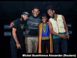Host Yvan Mendoza poses with performers Kyle Hernandez, Deneka Thomas, and Idrees Saleem at "True Talk No Lie", a monthly spoken word event in Port of Spain, Trinidad and Tobago, May 23, 2018.