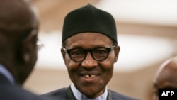 Le président nigérian Muhammadu Buhari assiste à une réception à la séance de clôture du Commonwealth Business Forum au Guildhall, au centre de Londres, le 18 avril 2018.