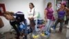 Venezuelan Shoppers Say Minimum Wage Hike Brings Little Relief 
