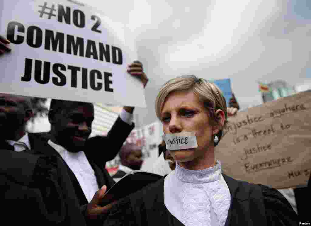 Zimbabwean lawyers march to demand justice for people detained in jail and others facing fast-track trials following recent protests in Harare, Zimbabwe.