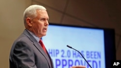 FILE - Then-Gov. Mike Pence delivers a speech in Indianapolis, Jan. 27, 2015.