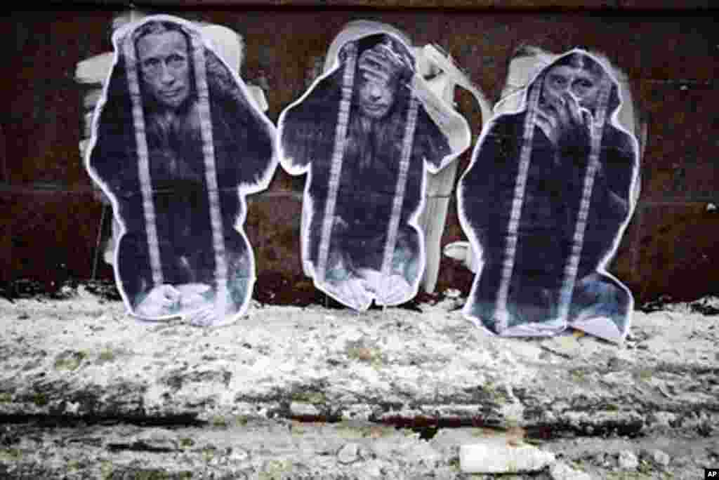 Hear no evil. See no evil. Speak no evil. A commentary at the protest on the way Prime Minister Vladimir Putin has reacted to the recent and growing protest movement in Russia, February 4, 2012. (VOA - Y. Weeks)