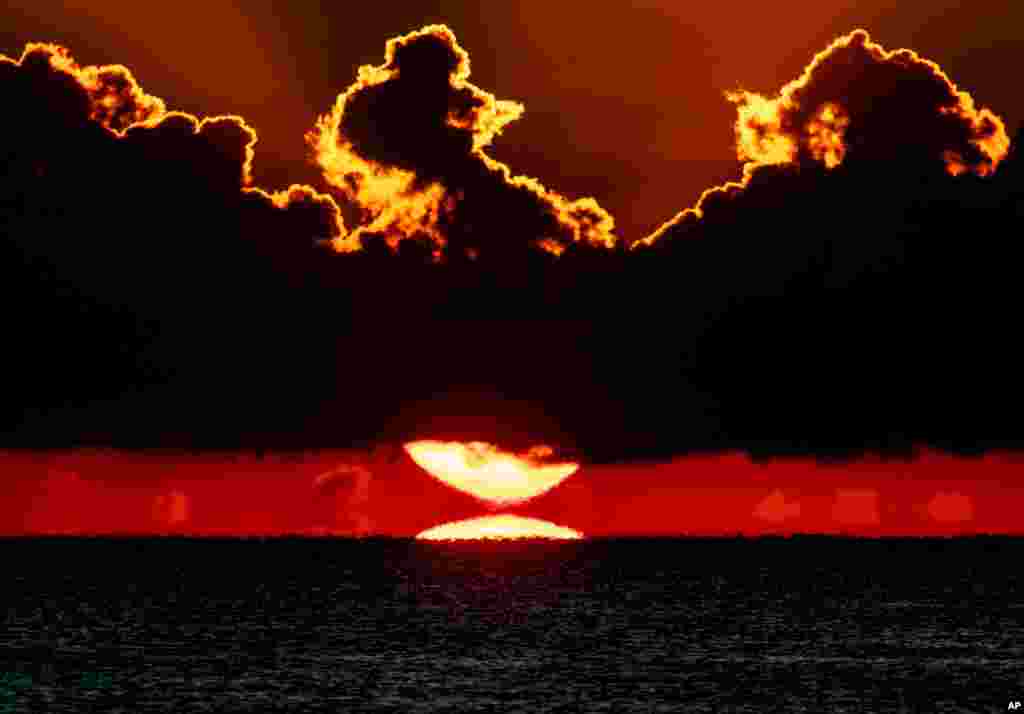 The sun rises over the Baltic Sea in Timmendorfer Strand, northern Germany.