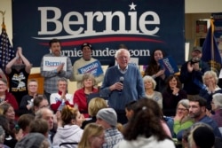 Democratic presidential candidate Sen. Bernie Sanders, I-Vt., smiles as he listens to a question from the audience during a campaign stop, Nov. 24, 2019, in Hillsboro, N.H.