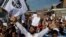 Kashmiri Muslims shout slogans during a protest after Eid prayers in Srinagar, Indian controlled Kashmir, Aug. 12, 2019. 