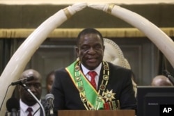 Zimbabwean President Emmerson Mnangagwa delivers his state of the nation address at the opening session of parliament in Harare, Oct. 1, 2019.