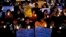 Activists from Bengaluru Solidarity Group, a social group, hold candles and placards during a vigil to commemorate the 30th anniversary of Bhopal gas tragedy, in the southern Indian city of Bengaluru, previously known as Bangalore, December 2, 2014.