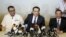 Malaysia's transport minister Liow Tiong Lai(C) speaks at a news conference about debris found on a beach in Mozambique that may be from missing Malaysia Airlines flight MH370, in Kuala Lumpur, Malaysia, March 3, 2016.