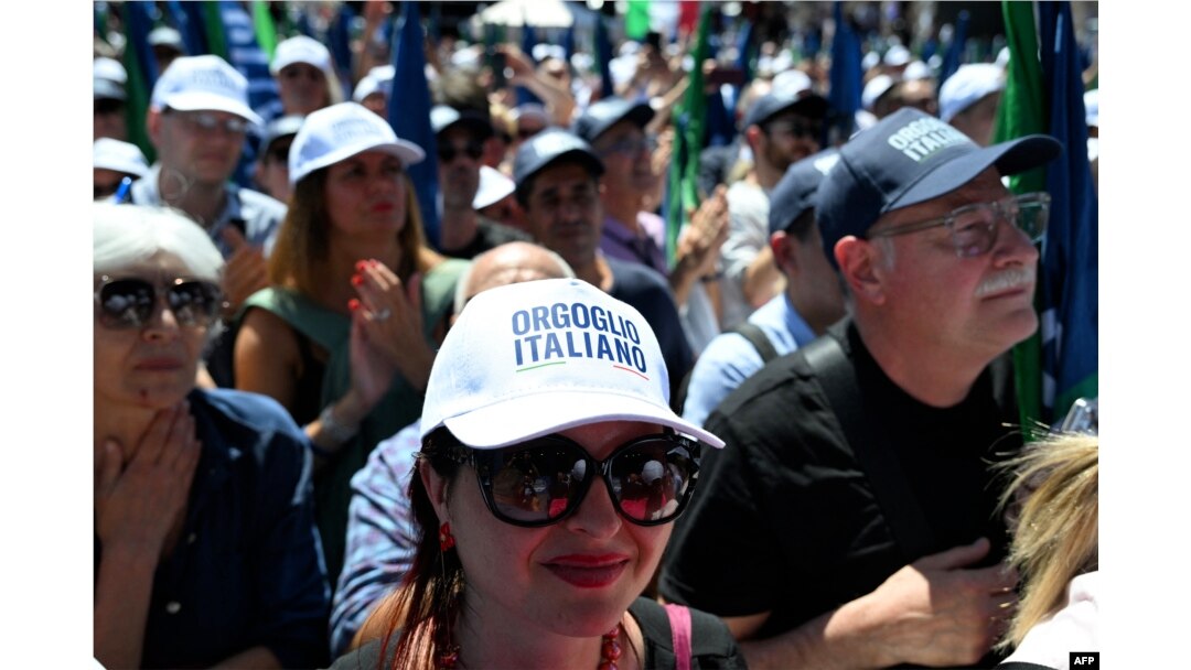 Supporters of Italian Prime Minister Giorgia Meloni attend a campaign meeting of Italian far-right party Brothers of Italy for the upcoming European elections, on June 1, 2024, in Rome.
