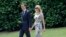 FILE - Ivanka Trump, daughter and assistant to President Donald Trump, and her husband, White House senior adviser Jared Kushner, walk out to join President Trump aboard Marine One helicopter at the White House, in Washington, May 19, 2017. 
