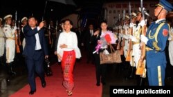 daw aung san suu kyi china trip start