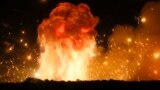 A powerful explosion is seen in the ammunition depot at a military base in Kalynivka, west of Kyiv, Ukraine.