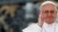 Pope Francis waves as he leads the weekly audience in Saint Peter's Square at the Vatican, April 10, 2013. 