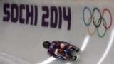 Hidenari Kanayama of Japan completes a training run in the men's luge singles ahead of the 2014 Winter Olympics, Feb. 4, 2014.