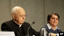 Cardinal Lorenzo Baldisseri and Sister Augusta de Oliveira attend a press conference presenting the post-synodal apostolic exhortation "Querida Amazonia" written by Pope Francis at the Vatican, Feb. 12, 2020. 