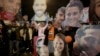 Demonstrators hold portraits of hostages held by Hamas in the Gaza Strip during a protest calling for their immediate release in Tel Aviv, Israel, Jan. 18, 2025. 