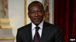 Le président Bénin Patrice Talon tient une conférence de presse conjointe avec le président français François Hollande (non visible) après leur rencontre à l'Elysée à Paris, France, 26 avril 2016. epa/ JEREMY LEMPIN