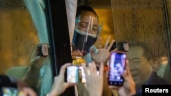 Weightlifter Hidilyn Diaz, the Philippines' first Olympic Gold medalist, arrives home from Tokyo, at the Ninoy Aquino International Airport in Pasay City, Philippines, July 28, 2021.