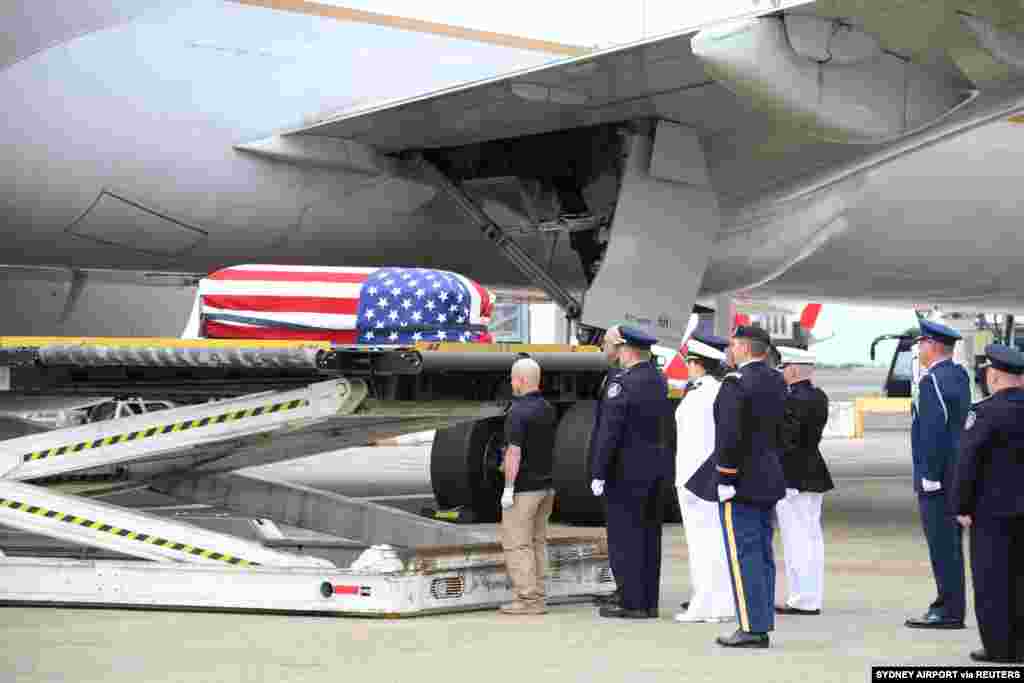 The repatriation ceremony for Ian McBeth, U.S. firefighter who died in an air tanker crash in Cooma, while fighting the bushfires, in Sydney, New South Wales, Australia in this picture obtained from social media. (Credit: Sydney Airport)