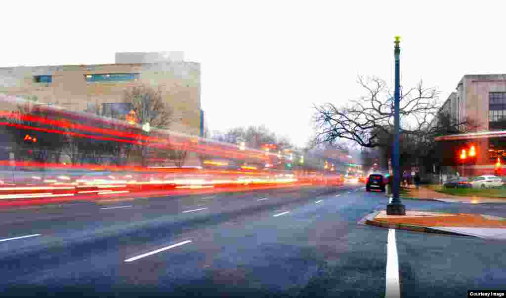 A trail of car lights resembling a train seen in a long-exposure photo taken by Diaa Bekheet in a rainy afternoon outside VOA building on Independence Ave., SW in Washington, D.C., Dec. 30, 2015