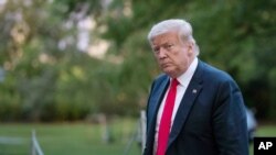 In this Thursday, June 25, 2020, file photo, President Donald Trump walks on the South Lawn after arriving on Marine One at the White House in Washington. 