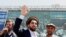 FILE - Ahmad Massoud, son of Afghanistan's slain anti-Soviet resistance hero Ahmad Shah Massoud, waves as he arrives to attend a gathering in Bazarak, Panjshir province, Afghanistan, Sept. 5, 2019. 