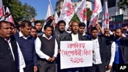 Activists from the All Assam Students Union (AASU) shout slogans during a protest against the government's bid to pass a bill in parliament to give citizenship to non-Muslims from neighboring countries, in Guwahati, India Jan. 7, 2019. 