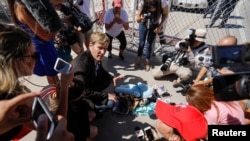 Albuquerque mayor Tim Keller leaves a stuff animal outside of the children's tent encampment built to deal with the Trump administrations "zero tolerance" policy in Tornillo, Texas, U.S. June 21, 2018.