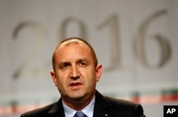 Bulgarian Socialists Party candidate Rumen Radev speaks during a press conference after presidential elections in Sofia, Bulgaria, Nov. 13, 2016. Bulgarians vote Sunday in their third election in four years.
