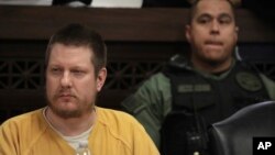 FILE - Former Chicago police Officer Jason Van Dyke attends his sentencing hearing, Jan. 18, 2019, at the Leighton Criminal Court Building in Chicago, for the 2014 shooting of Laquan McDonald. 