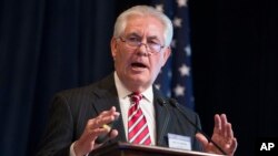 FILE - ExxonMobil CEO Rex Tillerson delivers remarks on the release of a report by the National Petroleum Council on oil drilling in the Arctic, in Washington, March 27, 2015.