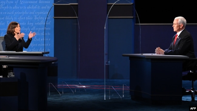 美国两大政党副总统候选人2020年10月7日晚在犹他州盐湖城首次直面辩论。