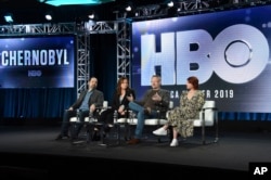 FILE - Panelists discuss the HBO Chernobyl minisiries in Pasadena, California, Feb. 8, 2019.