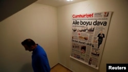 An employee of Cumhuriyet, an opposition secularist daily newspaper, is seen at the publication's headquarters in Istanbul, Turkey, Oct. 31, 2016.
