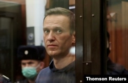 FILE PHOTO: Russian opposition leader Navalny attends a court hearing in Moscow