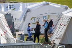 Medical personnel work at the Samaritan's Purse field hospital in New York's Central Park on April 1, 2020.