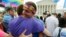 Gay rights supporters celebrate after the U.S. Supreme Court ruled that the U.S. Constitution provides same-sex couples the right to marry, outside the Supreme Court building in Washington, June 26, 2015.