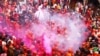 Devotees celebrate Holi, the festival of colors, inside Krishan temple in Nandgaon, Uttar Pradesh, India, in 2013.