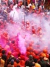 Devotees celebrate Holi, the festival of colors, inside Krishan temple in Nandgaon, Uttar Pradesh, India, in 2013.