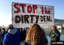 Demonstrators, mostly from international NGOs, gathered in Lesbos Monday to protest the first of the deportations of migrants from Greece to Turkey, April 4, 2016.