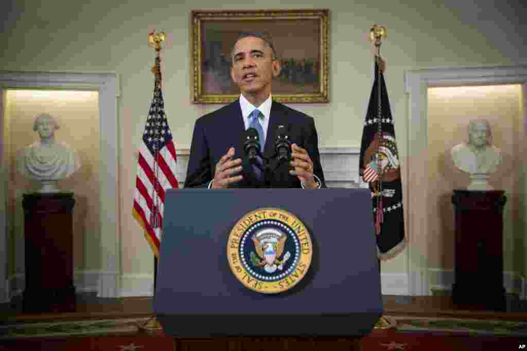 Prezident Barak Obama Kuba bilan aloqalar tiklangani haqida e&#39;lon qilmoqda. Oq uy, 17-dekabr, 2014-yil.