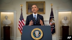 President Barack Obama announces a major shift in U.S. relations with Cuba, in the Cabinet Room of the White House in Washington, Dec. 17, 2014.