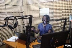 Tebby Otieno is a presenter at Mtaani Radio.She hosts a weekly shows that mainly talk about the issues faced by residents of Dagoretti area where the radio broadcasts, Dec. 14, 2016. (Photo: R.Ombour/VOA)